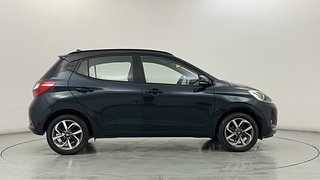 Used 2020 Hyundai Grand i10 Nios Sportz 1.2 Kappa VTVT Dual Tone Petrol Manual exterior RIGHT SIDE VIEW