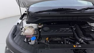 Used 2022 Kia Carens Prestige 1.4 Petrol 7 STR Petrol Manual engine ENGINE RIGHT SIDE HINGE & APRON VIEW