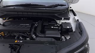 Used 2022 Kia Carens Prestige 1.4 Petrol 7 STR Petrol Manual engine ENGINE LEFT SIDE HINGE & APRON VIEW