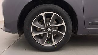 Used 2019 Hyundai Grand i10 [2017-2020] Sportz AT 1.2 Kappa VTVT Petrol Automatic tyres LEFT FRONT TYRE RIM VIEW