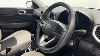 Used 2021 Hyundai Venue [2019-2022] S+ 1.2 Petrol Manual top_features Leather-wrapped steering wheel
