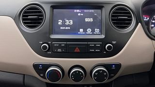 Used 2019 Hyundai Grand i10 [2017-2020] Sportz AT 1.2 Kappa VTVT Petrol Automatic interior MUSIC SYSTEM & AC CONTROL VIEW