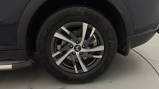 Used 2023 Mahindra XUV700 AX 5 Petrol MT 7 STR Petrol Manual tyres LEFT REAR TYRE RIM VIEW