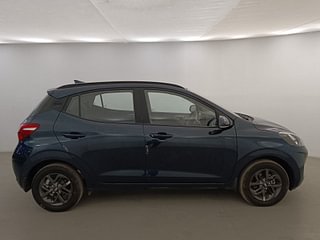 Used 2022 Hyundai Grand i10 Nios Sportz 1.2 Kappa VTVT Petrol Manual exterior RIGHT SIDE VIEW