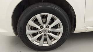Used 2014 Maruti Suzuki Ertiga [2012-2015] ZXi Petrol Manual tyres LEFT FRONT TYRE RIM VIEW