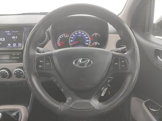 Used 2018 Hyundai Grand i10 [2017-2020] Sportz (O) 1.2 kappa VTVT Petrol Manual interior STEERING VIEW