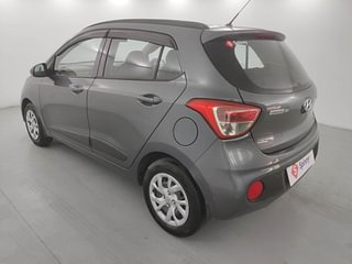 Used 2018 Hyundai Grand i10 [2017-2020] Sportz (O) 1.2 kappa VTVT Petrol Manual exterior LEFT REAR CORNER VIEW