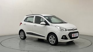 Used 2015 Hyundai Grand i10 [2013-2017] Sportz 1.2 Kappa VTVT Petrol Manual exterior RIGHT FRONT CORNER VIEW