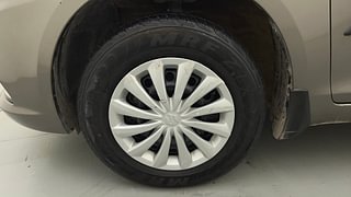 Used 2015 Maruti Suzuki Swift Dzire VXI Regalia Edition Petrol Manual tyres LEFT FRONT TYRE RIM VIEW