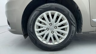 Used 2022 maruti-suzuki Dzire ZXI AMT Petrol Automatic tyres LEFT FRONT TYRE RIM VIEW