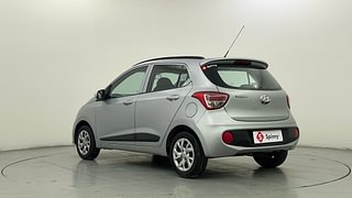 Used 2018 Hyundai Grand i10 [2017-2020] Sportz 1.2 Kappa VTVT Petrol Manual exterior LEFT REAR CORNER VIEW