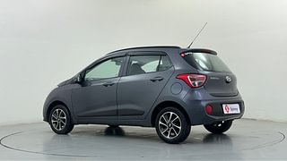 Used 2017 Hyundai Grand i10 [2017-2020] Sportz (O) AT 1.2 Kappa VTVT Petrol Automatic exterior LEFT REAR CORNER VIEW