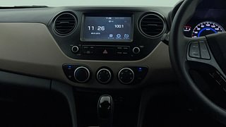 Used 2017 Hyundai Grand i10 [2017-2020] Sportz (O) AT 1.2 Kappa VTVT Petrol Automatic interior MUSIC SYSTEM & AC CONTROL VIEW