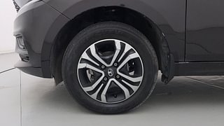 Used 2022 Tata Tiago Revotron XT Petrol Manual tyres LEFT FRONT TYRE RIM VIEW