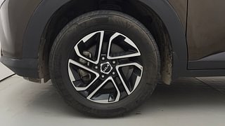 Used 2022 Kia Carens Prestige Plus 1.4 Petrol 7 STR Petrol Manual tyres LEFT FRONT TYRE RIM VIEW