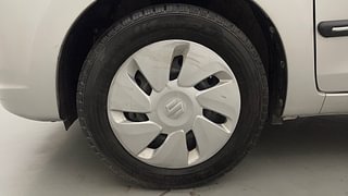 Used 2015 Maruti Suzuki Celerio VXI Petrol Manual tyres LEFT FRONT TYRE RIM VIEW