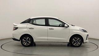 Used 2023 Hyundai Aura SX 1.2 (O) Petrol Petrol Manual exterior RIGHT SIDE VIEW