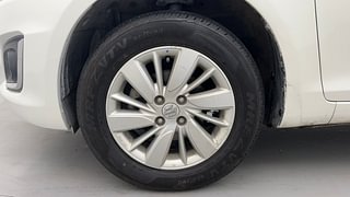 Used 2015 Maruti Suzuki Swift [2011-2017] ZXi Petrol Manual tyres LEFT FRONT TYRE RIM VIEW