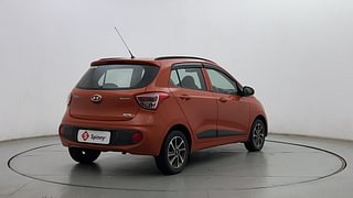 Used 2017 Hyundai Grand i10 [2017-2020] Sportz (O) AT 1.2 Kappa VTVT Petrol Automatic exterior RIGHT REAR CORNER VIEW