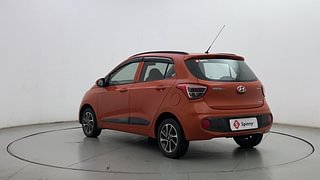 Used 2017 Hyundai Grand i10 [2017-2020] Sportz (O) AT 1.2 Kappa VTVT Petrol Automatic exterior LEFT REAR CORNER VIEW