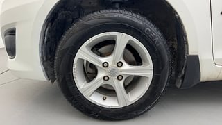 Used 2013 Maruti Suzuki Swift Dzire VXI Petrol Manual tyres LEFT FRONT TYRE RIM VIEW