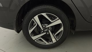 Used 2023 Hyundai Aura SX 1.2 Petrol Petrol Manual tyres RIGHT REAR TYRE RIM VIEW