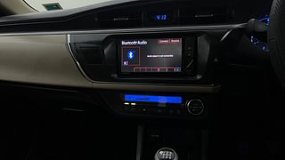 Used 2014 Toyota Corolla Altis [2014-2017] G Petrol Petrol Manual interior MUSIC SYSTEM & AC CONTROL VIEW