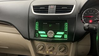 Used 2014 Maruti Suzuki Swift Dzire VXI Petrol Manual top_features Integrated (in-dash) music system