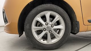 Used 2014 Hyundai Grand i10 [2013-2017] Asta AT 1.2 Kappa VTVT Petrol Automatic tyres LEFT FRONT TYRE RIM VIEW