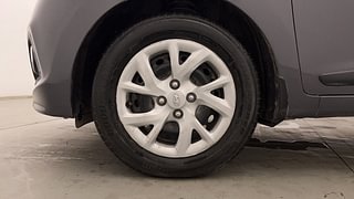 Used 2014 Hyundai Grand i10 [2013-2017] Sportz 1.1 CRDi Diesel Manual tyres LEFT FRONT TYRE RIM VIEW