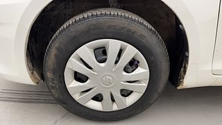 Used 2014 Maruti Suzuki Swift Dzire VXI Petrol Manual tyres LEFT FRONT TYRE RIM VIEW