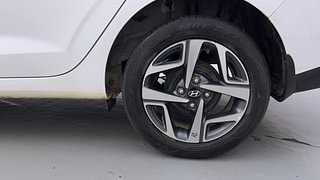 Used 2021 Hyundai Aura SX Plus 1.0 Petrol Petrol Manual tyres LEFT REAR TYRE RIM VIEW