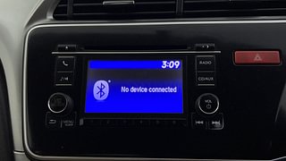 Used 2014 Honda City [2014-2017] V Petrol Manual top_features Integrated (in-dash) music system