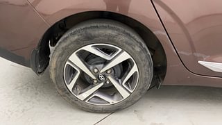 Used 2021 Hyundai Aura SX 1.2 Petrol Petrol Manual tyres RIGHT REAR TYRE RIM VIEW