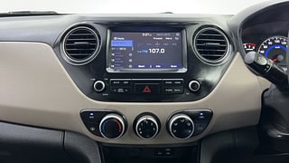 Used 2019 Hyundai Grand i10 Sportz 1.2 Kappa VTVT Petrol Manual interior MUSIC SYSTEM & AC CONTROL VIEW