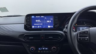 Used 2022 Hyundai Grand i10 Nios Sportz 1.0 Turbo GDI Petrol Manual top_features Integrated (in-dash) music system