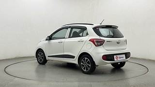 Used 2018 Hyundai Grand i10 [2017-2020] Sportz AT 1.2 Kappa VTVT Petrol Automatic exterior LEFT REAR CORNER VIEW