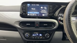 Used 2020 Hyundai Grand i10 Nios Sportz 1.2 Kappa VTVT Petrol Manual top_features Integrated (in-dash) music system