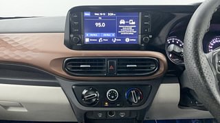 Used 2023 Hyundai Aura SX 1.2 CNG Petrol+cng Manual interior MUSIC SYSTEM & AC CONTROL VIEW