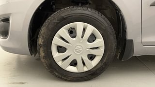 Used 2015 Maruti Suzuki Swift Dzire VXI Petrol Manual tyres LEFT FRONT TYRE RIM VIEW