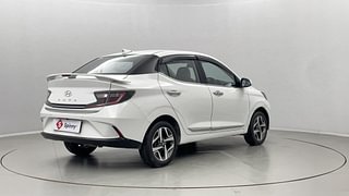 Used 2023 Hyundai Aura SX 1.2 CNG Petrol+cng Manual exterior RIGHT REAR CORNER VIEW