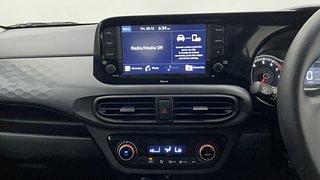 Used 2022 Hyundai Grand i10 Nios Sportz 1.0 Turbo GDI Petrol Manual interior MUSIC SYSTEM & AC CONTROL VIEW