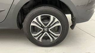 Used 2022 Tata Tigor Revotron XZ+ CNG Petrol+cng Manual tyres LEFT REAR TYRE RIM VIEW