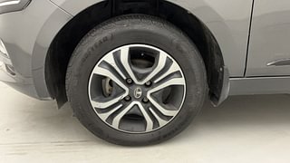 Used 2022 Tata Tigor Revotron XZ+ CNG Petrol+cng Manual tyres LEFT FRONT TYRE RIM VIEW