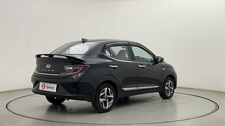 Used 2023 Hyundai Aura SX Plus 1.2 AMT Petrol Petrol Automatic exterior RIGHT REAR CORNER VIEW