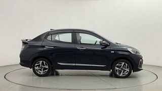 Used 2023 Hyundai Aura SX Plus 1.2 AMT Petrol Petrol Automatic exterior RIGHT SIDE VIEW