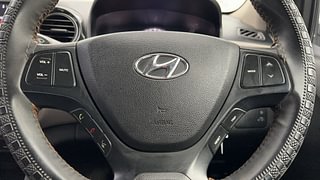 Used 2019 Hyundai Grand i10 [2017-2020] Sportz 1.2 Kappa VTVT Petrol Manual top_features Steering mounted controls
