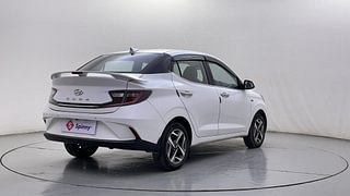Used 2022 Hyundai Aura SX Plus 1.2 AMT Petrol Petrol Automatic exterior RIGHT REAR CORNER VIEW