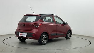 Used 2017 Hyundai Grand i10 [2017-2020] Sportz (O) AT 1.2 Kappa VTVT Petrol Automatic exterior RIGHT REAR CORNER VIEW