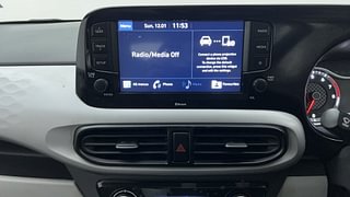 Used 2020 Hyundai Grand i10 Nios Sportz 1.2 Kappa VTVT Petrol Manual top_features Integrated (in-dash) music system